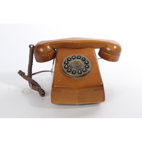 186 - A Steepletone wooden telephone.