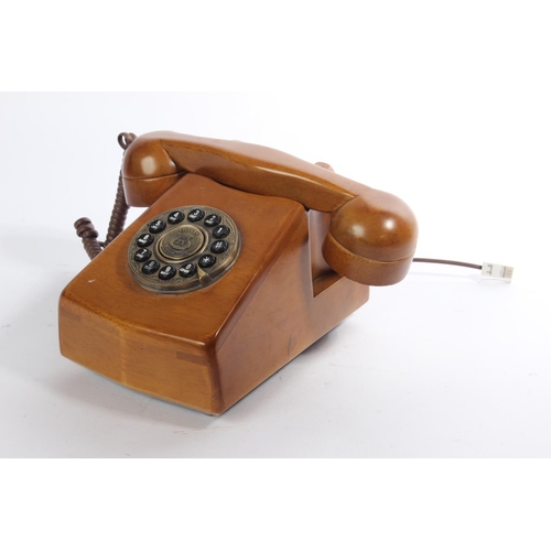 186 - A Steepletone wooden telephone.