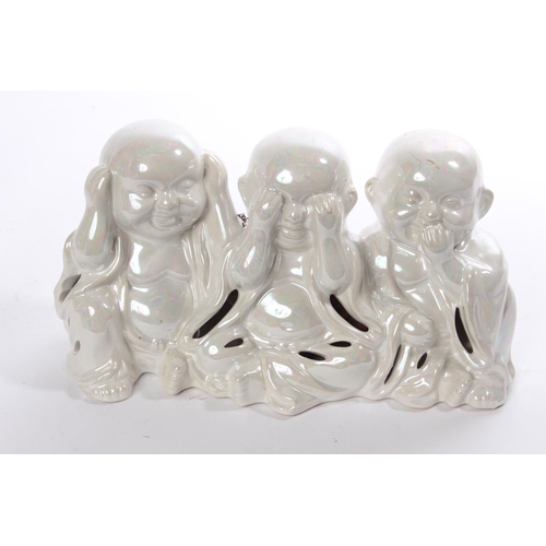 189 - A ceramic 'Hear No Evil, See No Evil, Speak No Evil' potpourri holder, measuring 10