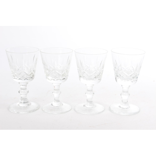 198 - A set of four sherry glasses.