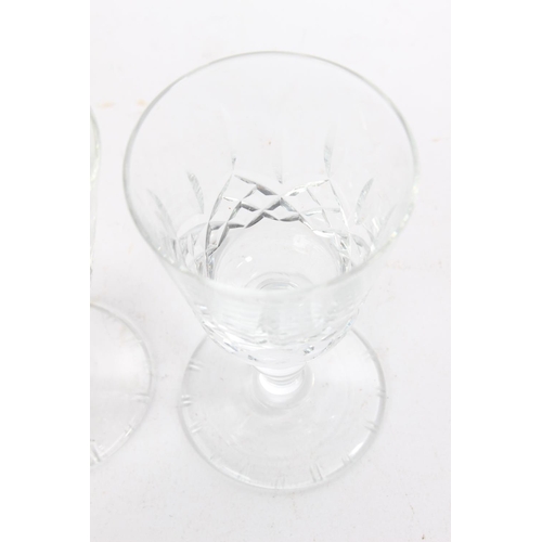 198 - A set of four sherry glasses.