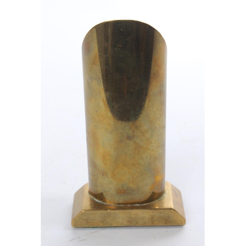 202 - An unusual heavy brass pen holder.