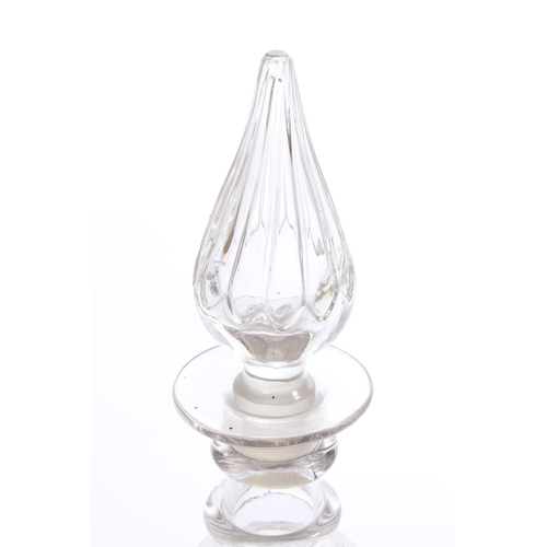 206 - A cut glass decanter and stopper.