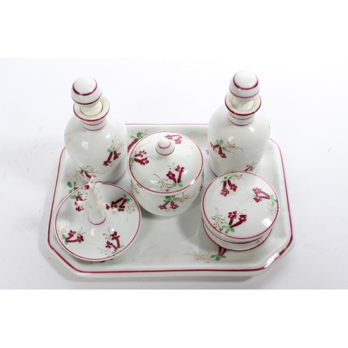 207 - A vintage porcelain dressing table set.