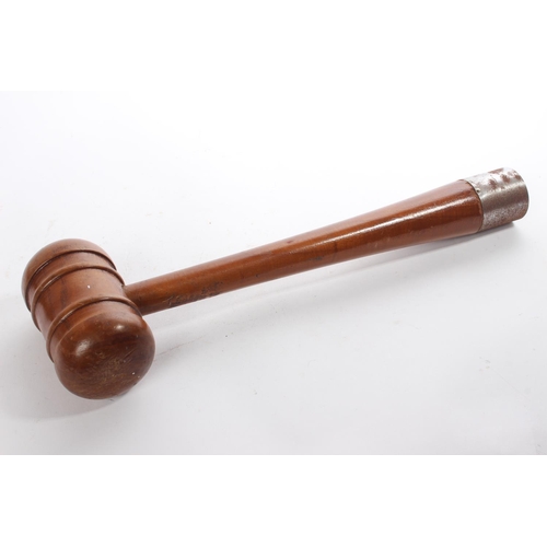 212 - A large wooden auctioneers gavel/mallet.