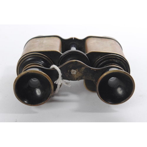 214 - A pair of antique binoculars/ field glasses.