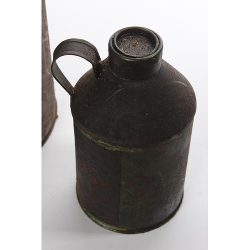 217 - Two antique oil cans.