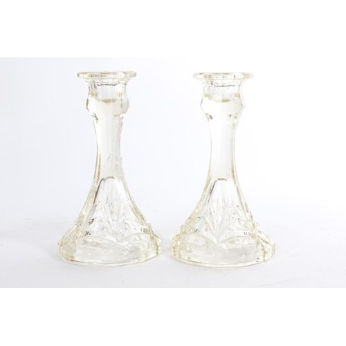 230 - Two vintage pressed glass candlesticks.