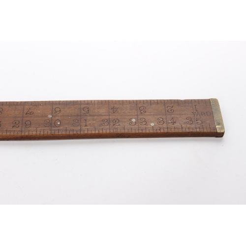 241 - A vintage one yard wooden ruler.