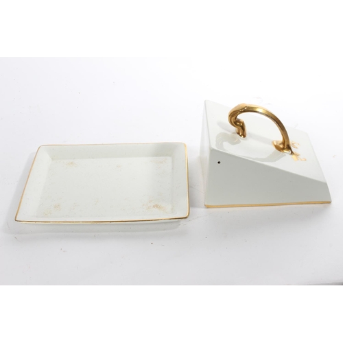 256 - An antique butter dish with gilt detail.