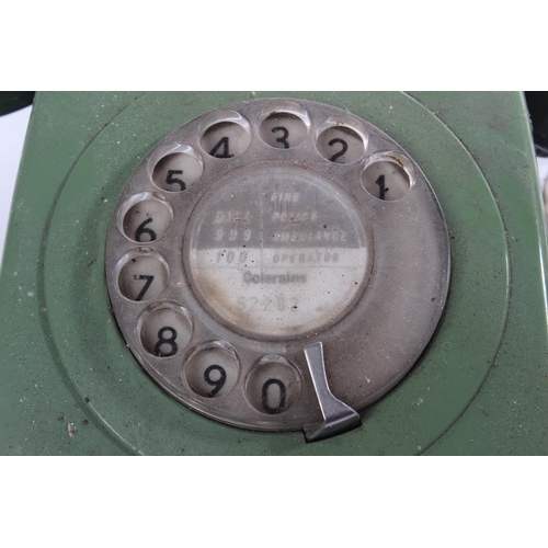 260 - A vintage rotary telephone.