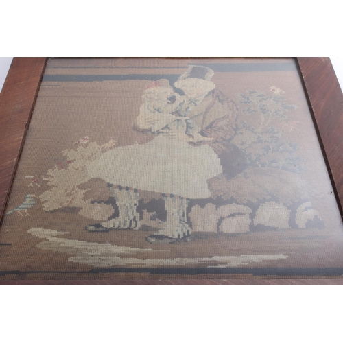 263 - An antique framed tapestry panel.