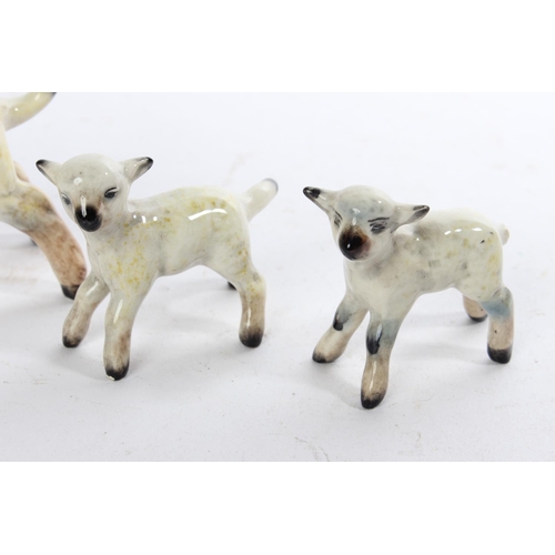 285 - A set of three Beswick lambs.