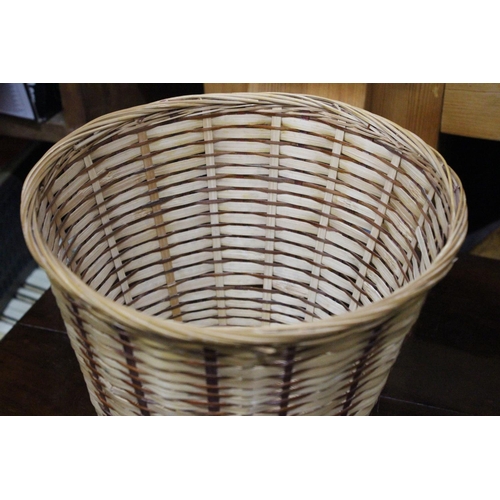 411 - A vintage wicker paper basket.