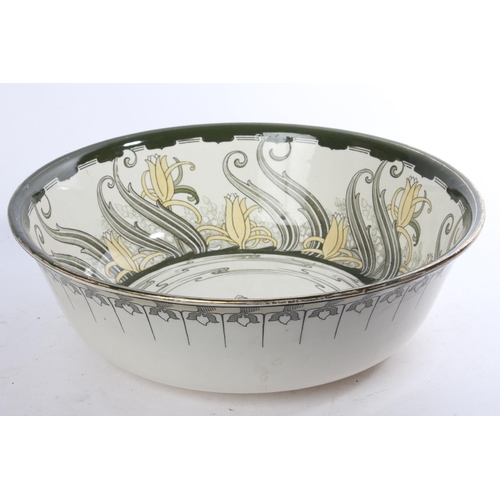 413 - A Royal Doulton wash bowl with lily pattern.