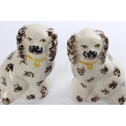 419 - A pair of Spongeware mantle dogs.