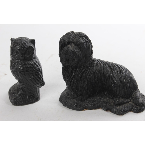 420 - Two hedgehogs and an owl made from Irish peat and another of a dog made from coal.