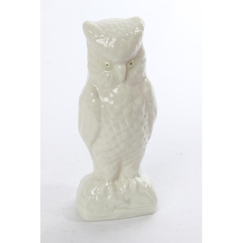 421 - A Belleek pottery ornament of an owl.