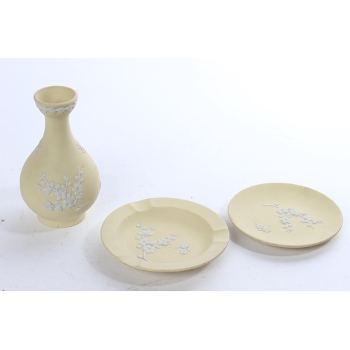 422 - Three pieces of Wedgwood white on primrose Jasper Ware.