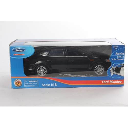 471 - A boxed Ford Mondeo toy car, scale 1:18.