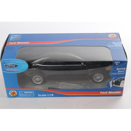 471 - A boxed Ford Mondeo toy car, scale 1:18.