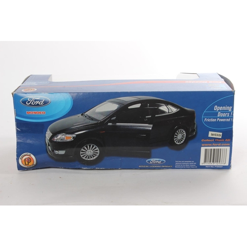 471 - A boxed Ford Mondeo toy car, scale 1:18.