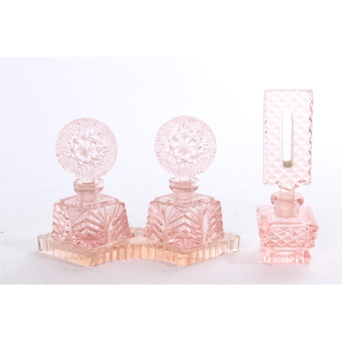 477 - A vintage glass perfume set.