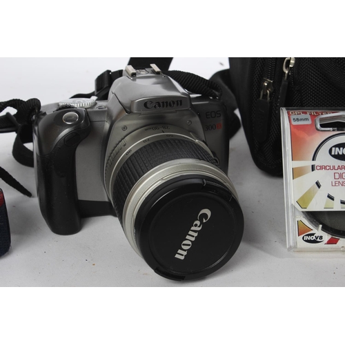 484 - A Canon EOS 300X camera with 28-90mm zoom lens, plus Canon speedlite 420EX.