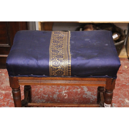 491 - An upholstered stool.