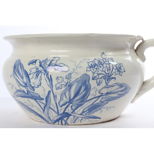 497 - A vintage floral patterned chamber pot.