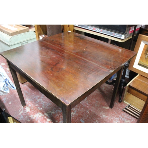 306 - An antique mahogany turnover leaf table.