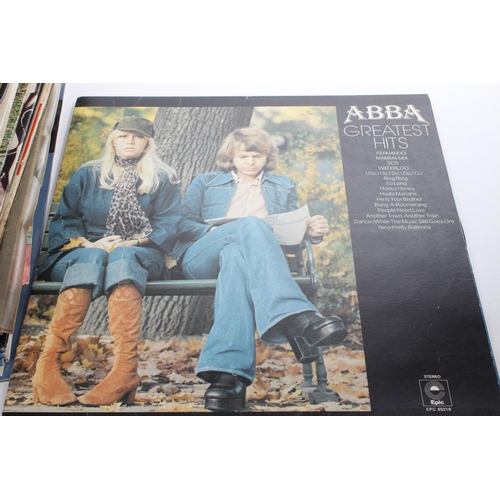 310 - A collection of vintage records/albums to include John Denver, Don Williams, ABBA Greatest Hits, Bes... 