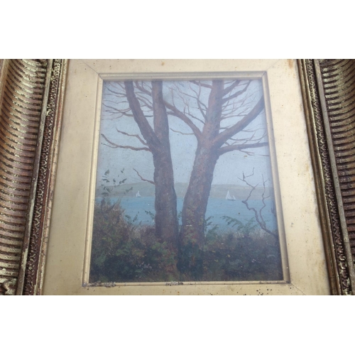 311 - An antique gilt framed oil painting on board.