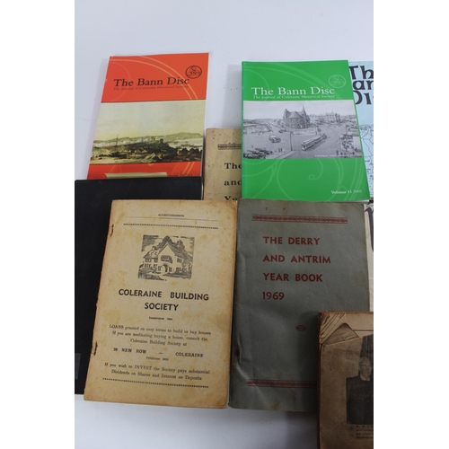 323 - A collection of vintage Derry & Antrim Year Books, The Bann Disc and more.