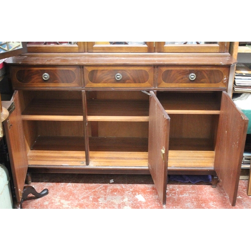 324 - A mahogany and inlay three door display cabinet.