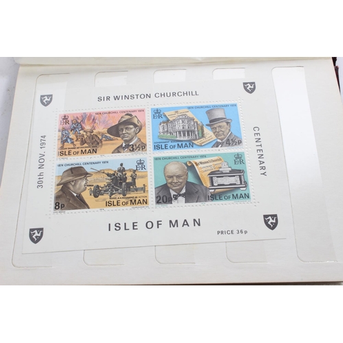 335 - A vintage Netto stamp album and contents and a framed set of four Isle of Man 'Manx Rally' postage s... 