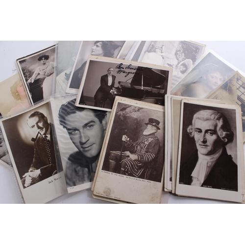 338 - A collection of antique portrait postcards and more.