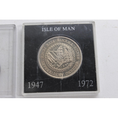 345 - A cased 1970 Gibraltar Crown, a cased 1972 Isle of Man commemorative Silver Wedding Anniversary 25p ... 