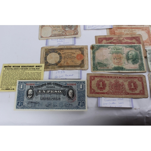 347 - A large lot of antique foreign bank notes to include two WWII Allied Military One Lire notes, a New ... 