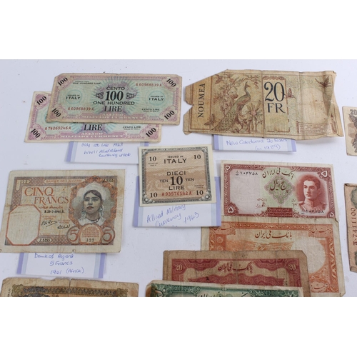 347 - A large lot of antique foreign bank notes to include two WWII Allied Military One Lire notes, a New ... 