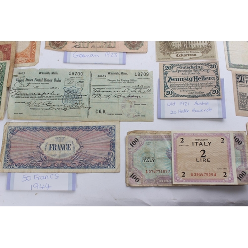 347 - A large lot of antique foreign bank notes to include two WWII Allied Military One Lire notes, a New ... 