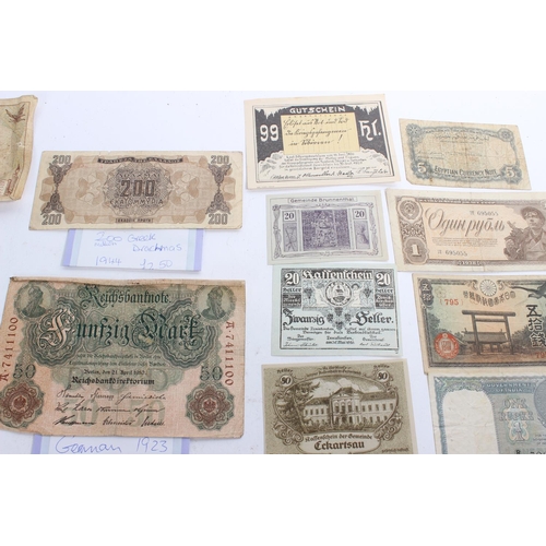 347 - A large lot of antique foreign bank notes to include two WWII Allied Military One Lire notes, a New ... 