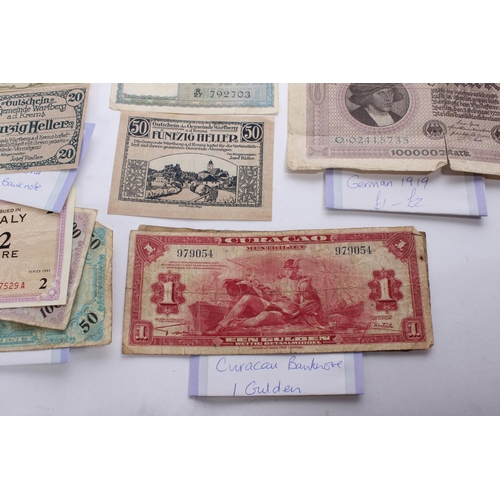 347 - A large lot of antique foreign bank notes to include two WWII Allied Military One Lire notes, a New ... 