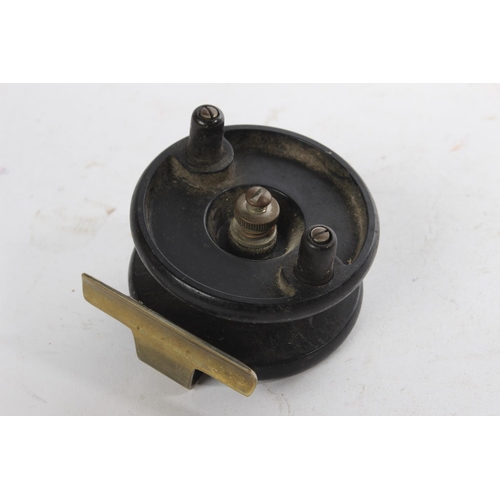 353 - A small centre pin bakelite reel.