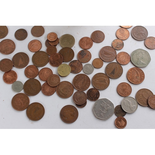 362 - A small antique stoneware pot and a lot of assorted coinage.