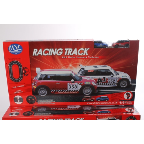 376 - Four new 'Stitch Electric Racetrack Challenge' racing car sets.