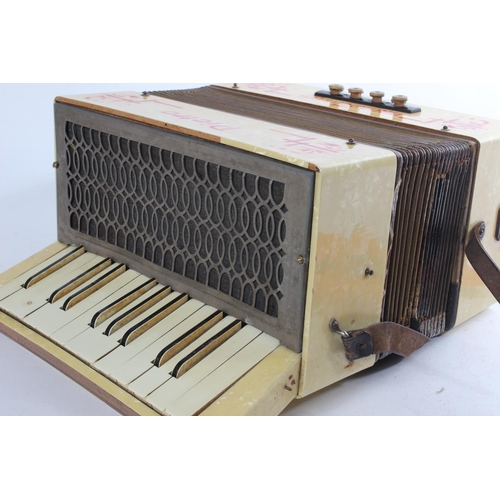 381 - A vintage cased Pietro 'The Broadcaster' accordion together with a 'First Step' How to play the Pian... 