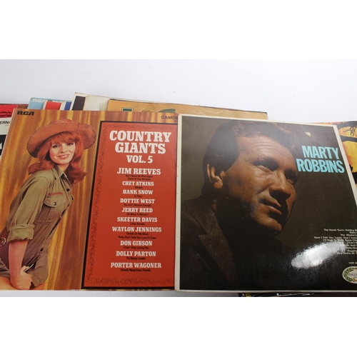 383 - A collection of vintage records/albums to include Jonny Cash, James Ray, Barbara Streisand and more.