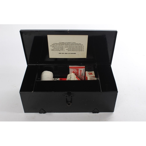 391 - A vintage metal Fassett & Johnston Ltd first aid box and contents.