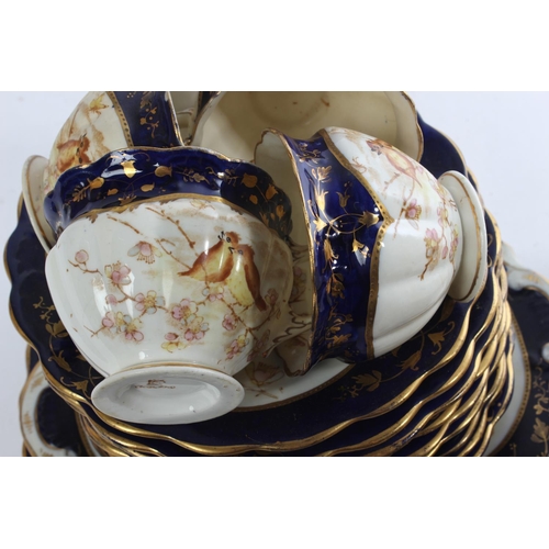 394 - A stunning antique bone china tea set decorated with birds (a/f).